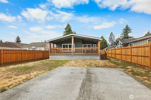 120 L St SE, Auburn, WA 98002 - rear view of house with a fenced backyard