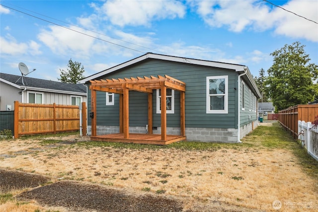 120 L St SE, Auburn, WA 98002 - rear view of property featuring a pergola, a fenced backyard, and a deck