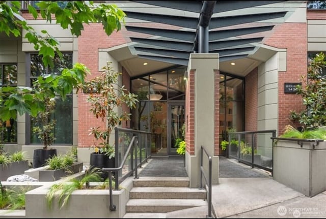 1420 Terry Ave Unit 907, Seattle, WA 98101 - entrance to property featuring brick siding and a porch