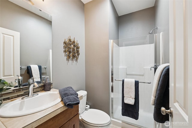 12009 31st Pl NE, Lake Stevens, WA 98258 - full bathroom with a stall shower, vanity, and tasteful backsplash