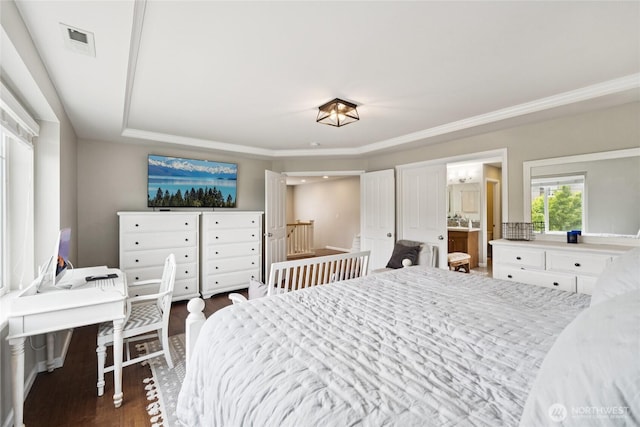 12009 31st Pl NE, Lake Stevens, WA 98258 - bedroom with wood finished floors, ensuite bath, and ornamental molding