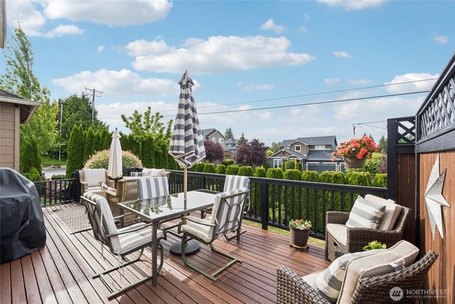 12009 31st Pl NE, Lake Stevens, WA 98258 - wooden deck featuring outdoor dining area and area for grilling
