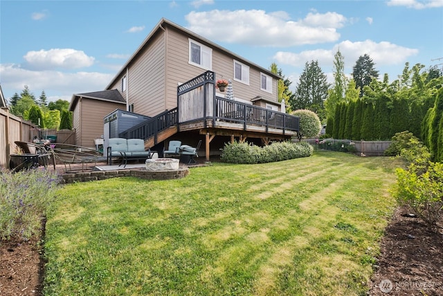 12009 31st Pl NE, Lake Stevens, WA 98258 - rear view of house with a deck, a fenced backyard, and a patio