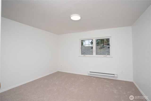 3207 N 9th St, Tacoma, WA 98406 - carpeted spare room featuring a baseboard radiator and baseboards