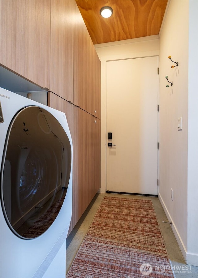 23648 Cliffe Pointe Rd NW Unit 10C, Quincy, WA 98848 - washroom with cabinet space and washer / dryer