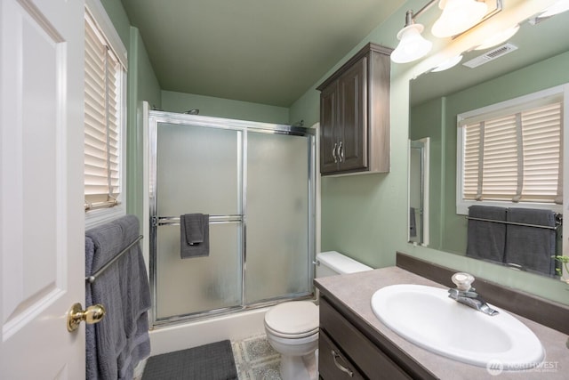 7649 Mcdougal Ave NE, Moses Lake, WA 98837 - full bathroom featuring a shower with door and vanity