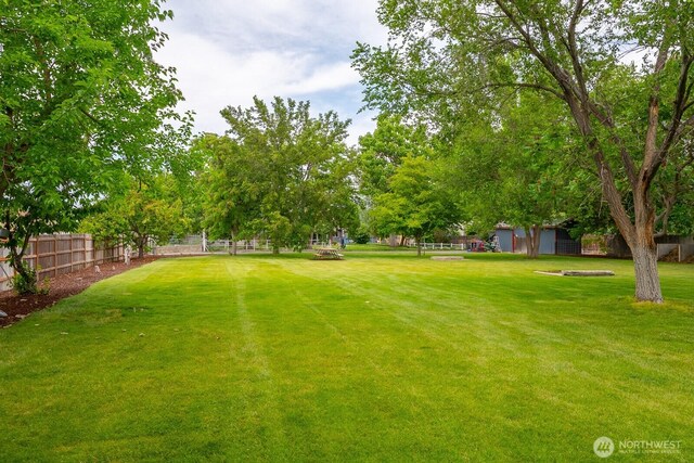 7649 Mcdougal Ave NE, Moses Lake, WA 98837 - view of yard with an outbuilding