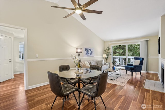 13145 102nd Ln NE Unit 6, Kirkland, WA 98034 - dining area with wood finished floors, high vaulted ceiling, and a ceiling fan