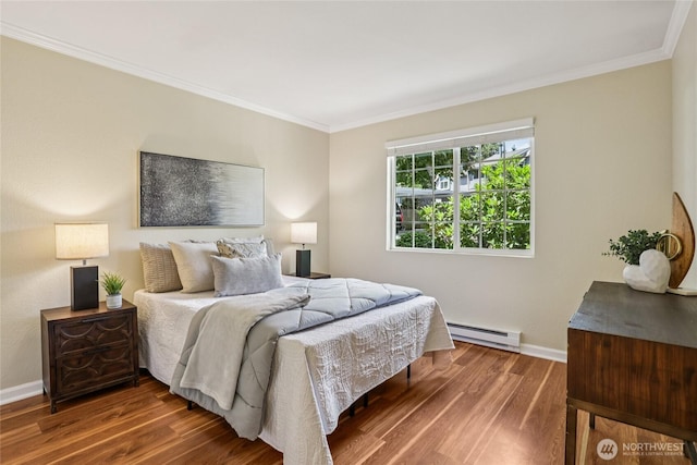 13145 102nd Ln NE Unit 6, Kirkland, WA 98034 - bedroom with a baseboard radiator, crown molding, and wood finished floors
