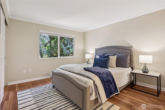 13145 102nd Ln NE Unit 6, Kirkland, WA 98034 - bedroom with wood finished floors and crown molding