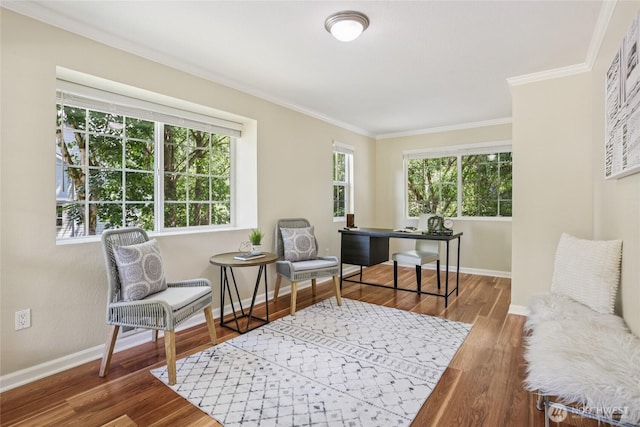 13145 102nd Ln NE Unit 6, Kirkland, WA 98034 - sitting room with ornamental molding, plenty of natural light, wood finished floors, and a desk