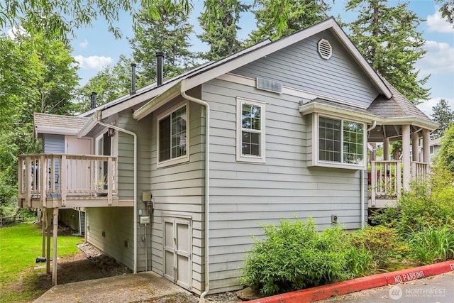 13145 102nd Ln NE Unit 6, Kirkland, WA 98034 - view of home's exterior featuring a deck