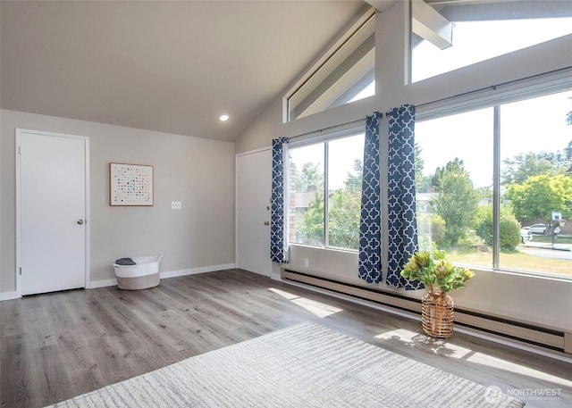 9610 Belmont Dr, Everett, WA 98208 - bedroom with vaulted ceiling, wood finished floors, and recessed lighting