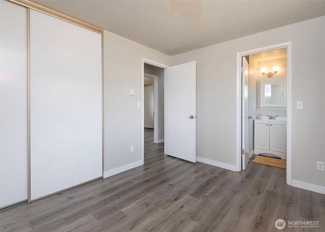 9610 Belmont Dr, Everett, WA 98208 - unfurnished bedroom with wood finished floors and a closet