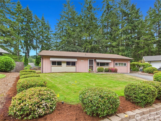 5511 Chokecherry Cir W, University Place, WA 98467 - view of front facade featuring asphalt driveway and an attached garage