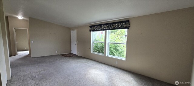 57 Clemons Rd Unit 17, Montesano, WA 98563 - spare room with carpet and vaulted ceiling