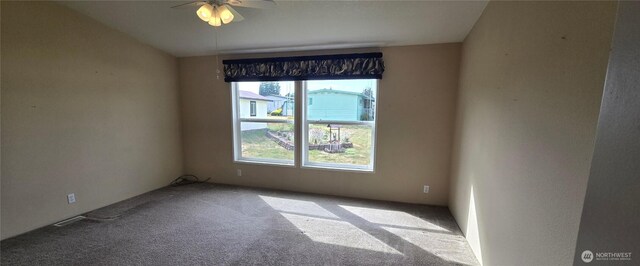 57 Clemons Rd Unit 17, Montesano, WA 98563 - spare room featuring carpet flooring and a ceiling fan
