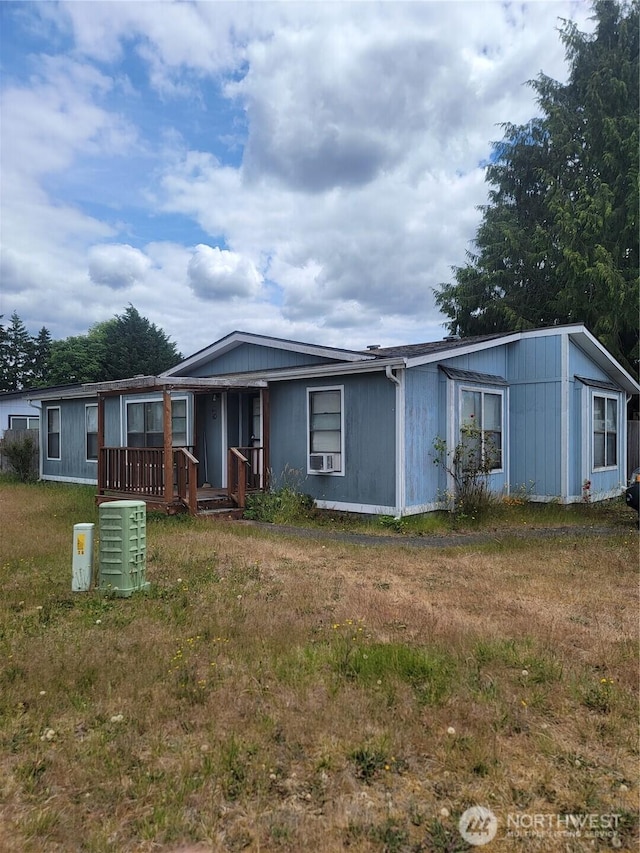 1502 Yelm Ave W Unit 7, Yelm, WA 98597 - view of front of house featuring a front lawn