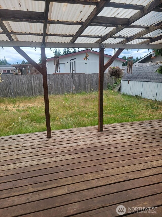 1502 Yelm Ave W Unit 7, Yelm, WA 98597 - wooden terrace featuring a fenced backyard