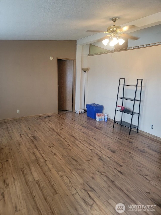 1502 Yelm Ave W Unit 7, Yelm, WA 98597 - unfurnished room featuring ceiling fan and wood finished floors