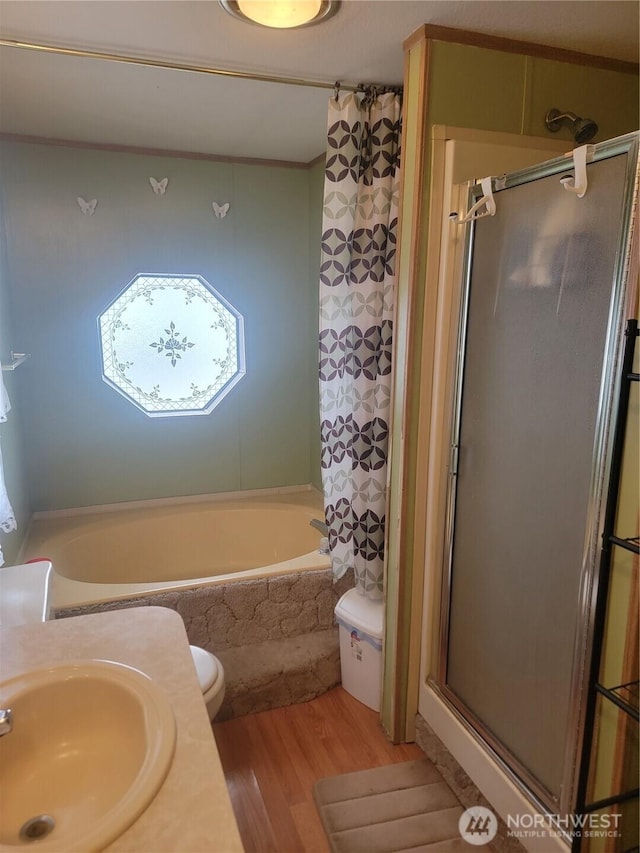 1502 Yelm Ave W Unit 7, Yelm, WA 98597 - bathroom featuring a shower with shower curtain, wood finished floors, a bath, and vanity