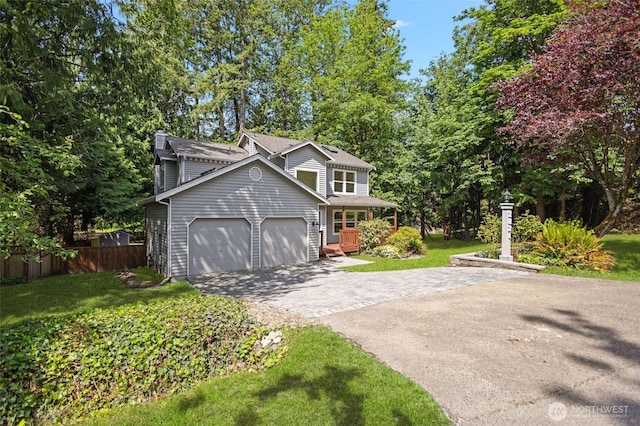 2021 224th Pl NE, Sammamish, WA 98074 - traditional-style house with a garage, driveway, and a chimney