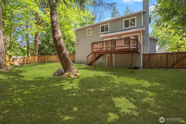2021 224th Pl NE, Sammamish, WA 98074 - rear view of property with stairs, a fenced backyard, a deck, and a chimney