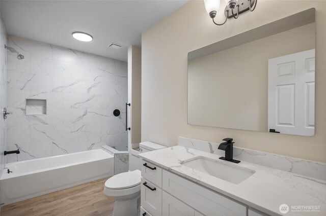 2021 224th Pl NE, Sammamish, WA 98074 - full bathroom with vanity, wood finished floors, and bathing tub / shower combination