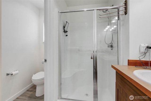 990 43rd Ct NE, Auburn, WA 98002 - full bathroom featuring a shower stall, vanity, and wood finished floors