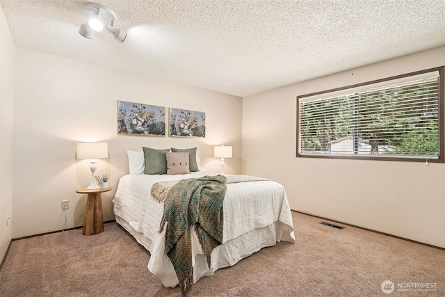 8524 46th Ct NE, Olympia, WA 98516 - bedroom with carpet flooring and a textured ceiling