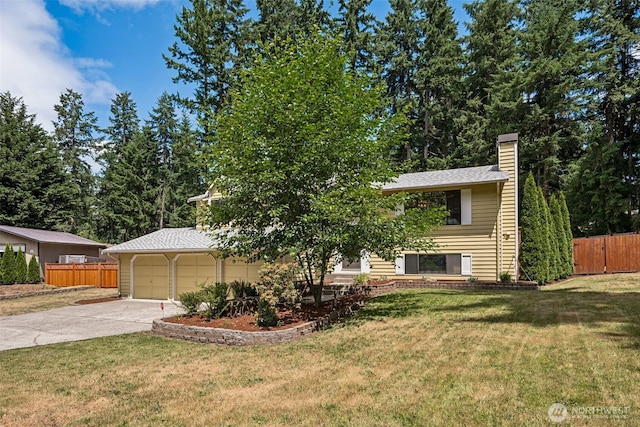 8524 46th Ct NE, Olympia, WA 98516 - view of front of property featuring a chimney, driveway, and an attached garage