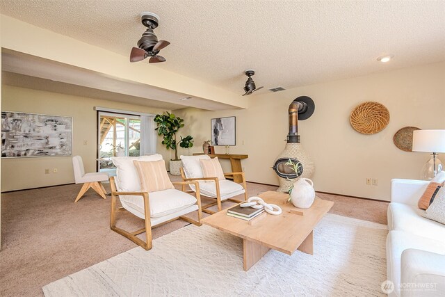 8524 46th Ct NE, Olympia, WA 98516 - living room with a textured ceiling, light carpet, and ceiling fan