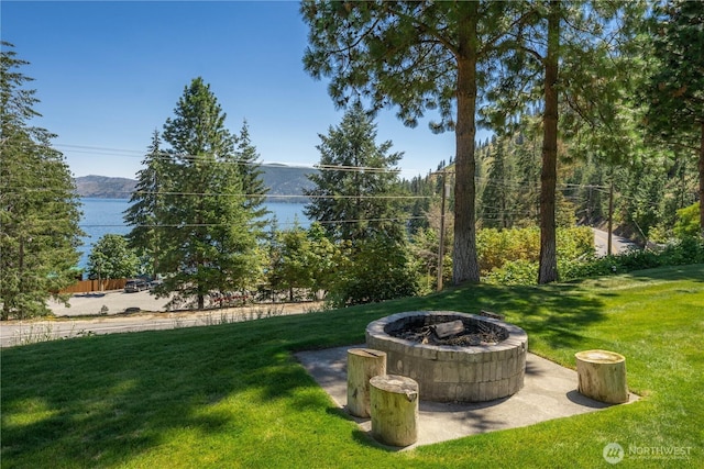 11155 S Lakeshore Rd, Chelan, WA 98816 - view of green lawn featuring an outdoor fire pit