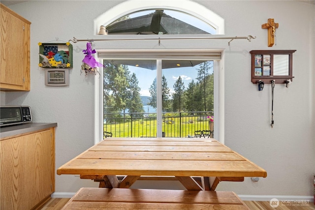 11155 S Lakeshore Rd, Chelan, WA 98816 - dining space with light wood finished floors and baseboards