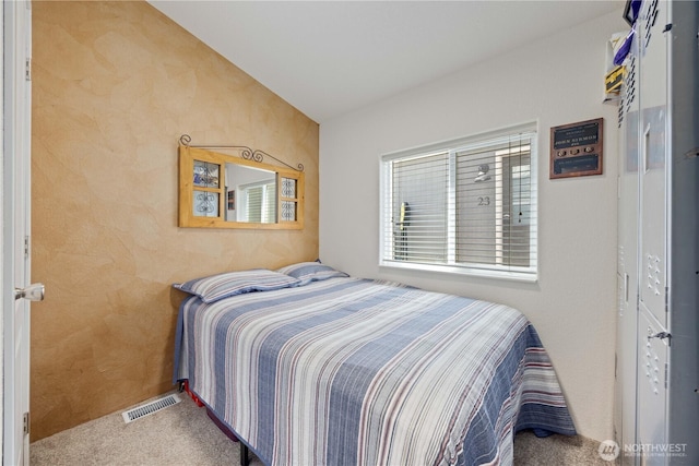 11155 S Lakeshore Rd, Chelan, WA 98816 - bedroom featuring carpet floors and lofted ceiling