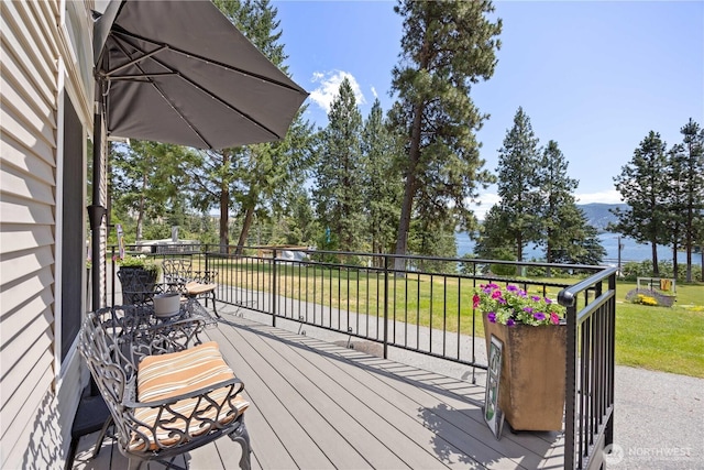 11155 S Lakeshore Rd, Chelan, WA 98816 - wooden deck featuring a lawn