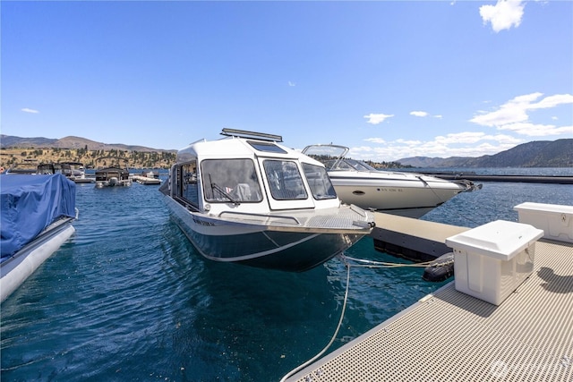 11155 S Lakeshore Rd, Chelan, WA 98816 - dock featuring a water and mountain view
