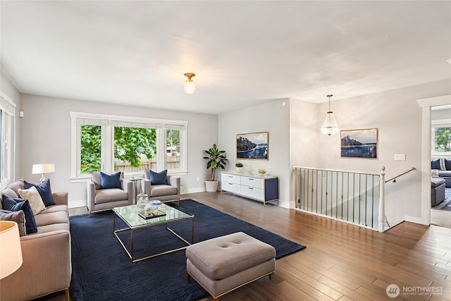 611 Elizabeth St, Sumner, WA 98390 - living room with healthy amount of natural light and wood finished floors