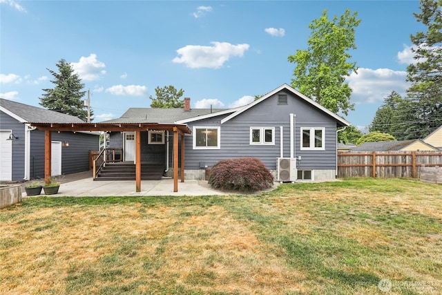 611 Elizabeth St, Sumner, WA 98390 - rear view of property with a patio area and a chimney