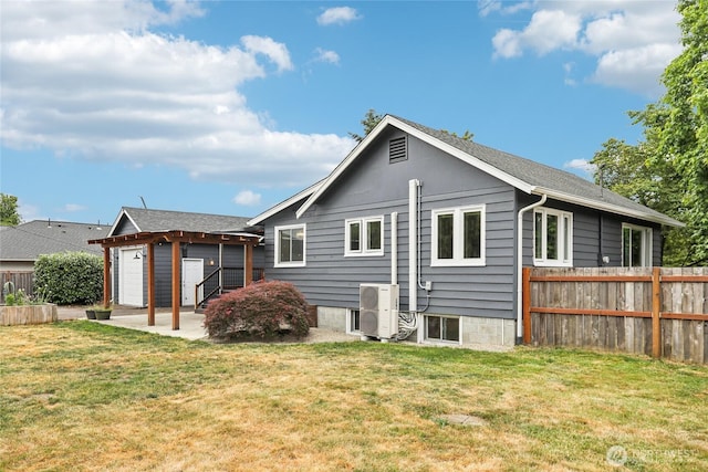 611 Elizabeth St, Sumner, WA 98390 - rear view of property with a patio area