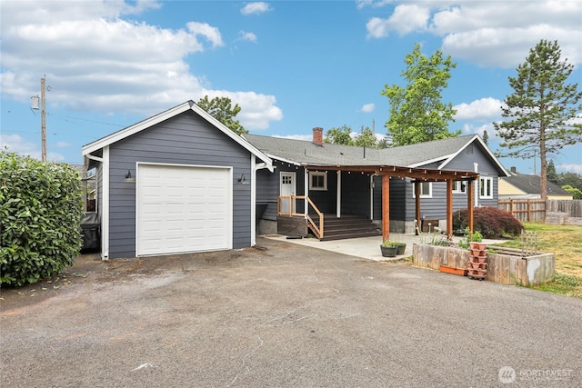 611 Elizabeth St, Sumner, WA 98390 - ranch-style home with an attached garage and driveway