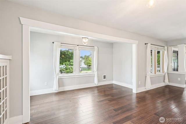 611 Elizabeth St, Sumner, WA 98390 - spare room featuring wood finished floors
