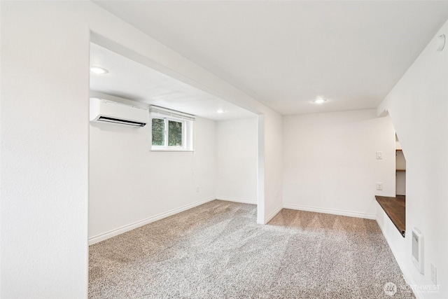 611 Elizabeth St, Sumner, WA 98390 - basement featuring an AC wall unit, carpet floors, and recessed lighting