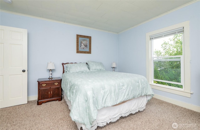 603 W 1st St, Nooksack, WA 98276 - carpeted bedroom featuring ornamental molding and baseboards