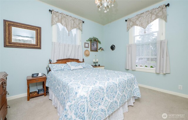 603 W 1st St, Nooksack, WA 98276 - bedroom featuring carpet and a chandelier