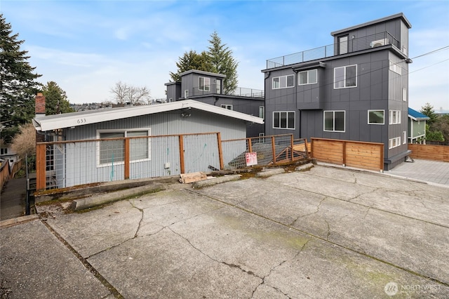 633 W Emerson St, Seattle, WA 98119 - back of house with board and batten siding