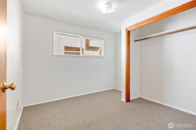 633 W Emerson St, Seattle, WA 98119 - unfurnished bedroom featuring carpet and a closet