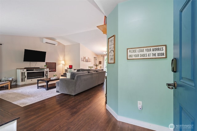 130 Kimberlund Ln, Chehalis, WA 98532 - living room with a wall mounted AC, dark wood-type flooring, and lofted ceiling