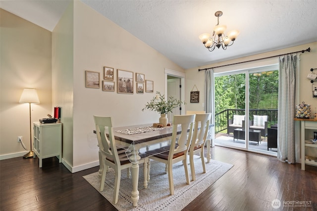 130 Kimberlund Ln, Chehalis, WA 98532 - dining area featuring lofted ceiling, a chandelier, dark wood-style flooring, and a textured ceiling