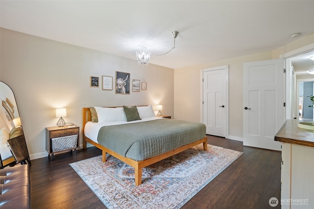 130 Kimberlund Ln, Chehalis, WA 98532 - bedroom featuring dark wood finished floors and a chandelier